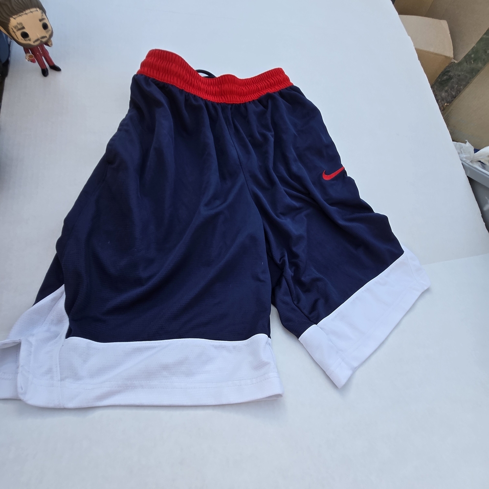 Nike Men's Navy Blue Athletic Shorts with Red Waistband and White Hem